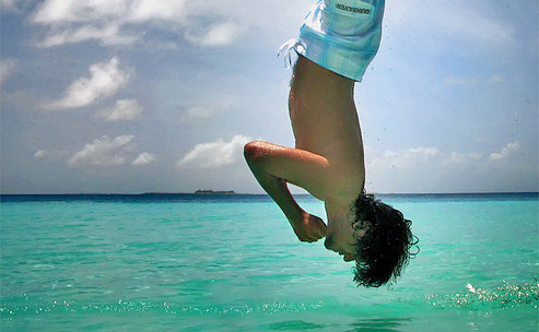 Head first into the water
